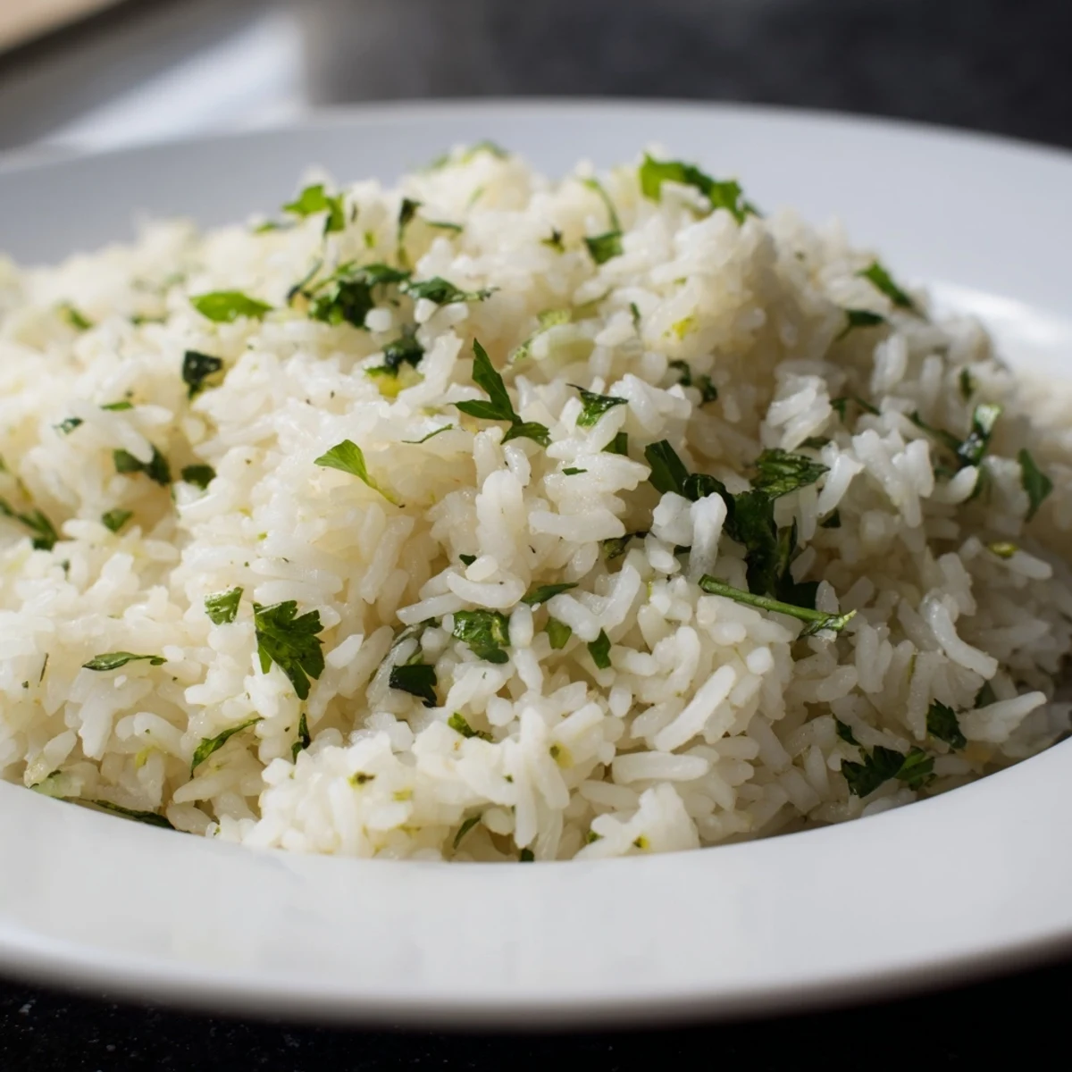 Fresh cilantro lime rice, ready to serve, a flavorful accompaniment to tacos or grilled chicken.