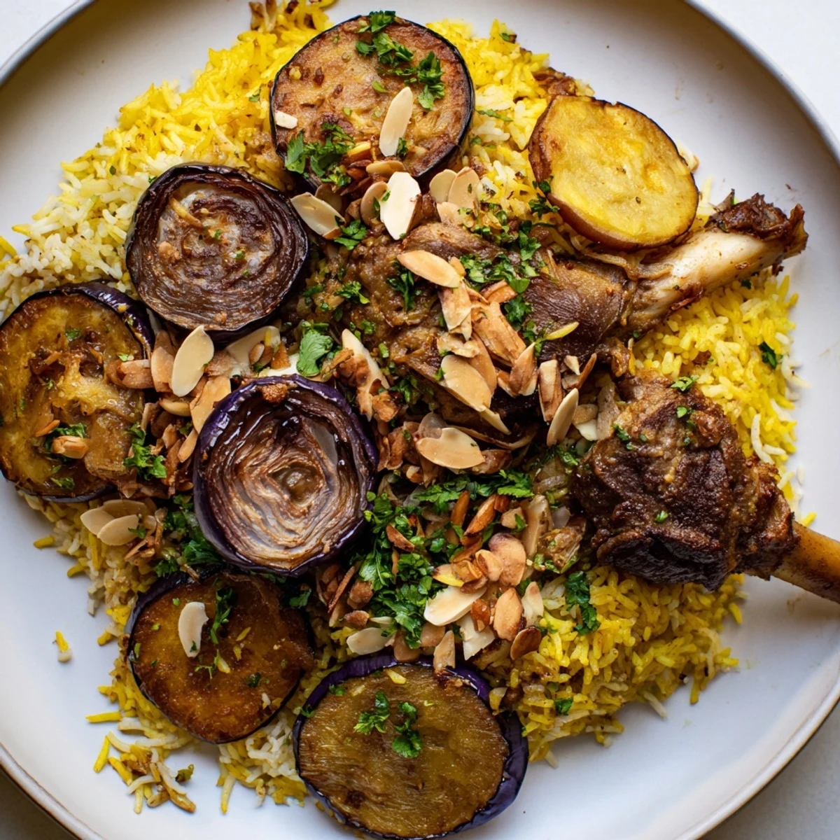 Aromatic layers of tender meat, fluffy rice, and vegetables compose this beautiful Palestinian Maqluba dish.