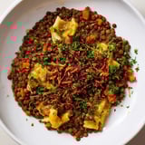 Cozy Budget Lentil & Spätzle Bowl, a hearty vegetarian meal with lentils, vegetables, and pasta.