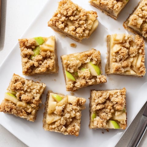 Golden-brown Apple Streusel Breakfast Bars provide a sweet, spiced breakfast with buttery streusel topping.