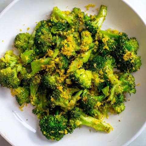 Crispy Lemon Garlic Roasted Broccoli glistens, ready to serve as a vibrant side dish.