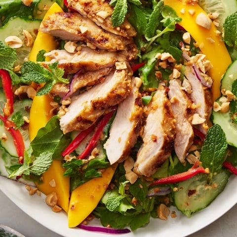 Thai Mango Chicken Salad overflowing with vibrant colors: juicy mango and tender chicken.