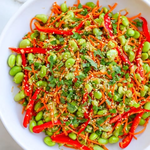 Crispy Asian Edamame Salad with vibrant veggies in a sesame ginger dressing, perfect for dinner.