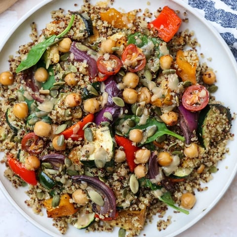 Quinoa Power Protein Salad, featuring roasted vegetables and creamy dressing, looks incredibly fresh.