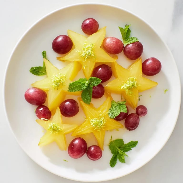 Fresh brunch fruit with starfruit, and grapes, a visually appealing and refreshing side dish.